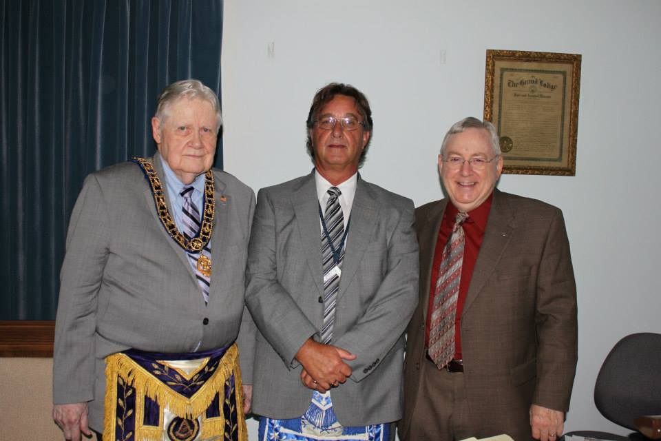 Bunn T. Phillips Past Grand Master, Steve McIver Master, Bill Horne Past Master and Past Distric Deputy Grand Master